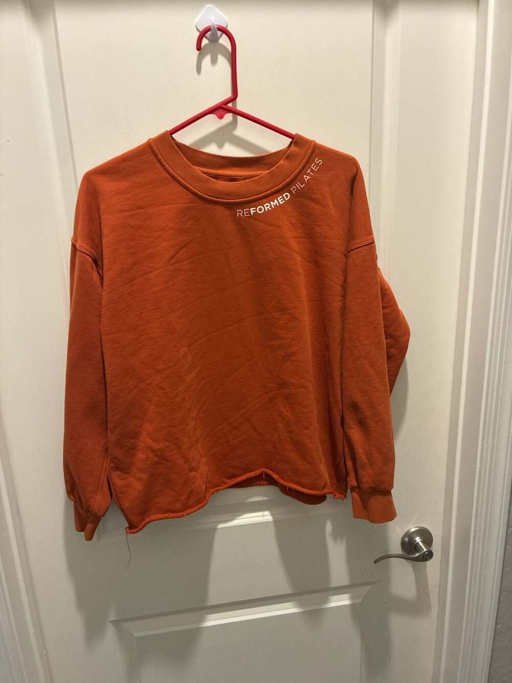 Reformed Pilates Orange Crewneck Sweatshirt Raw Hem